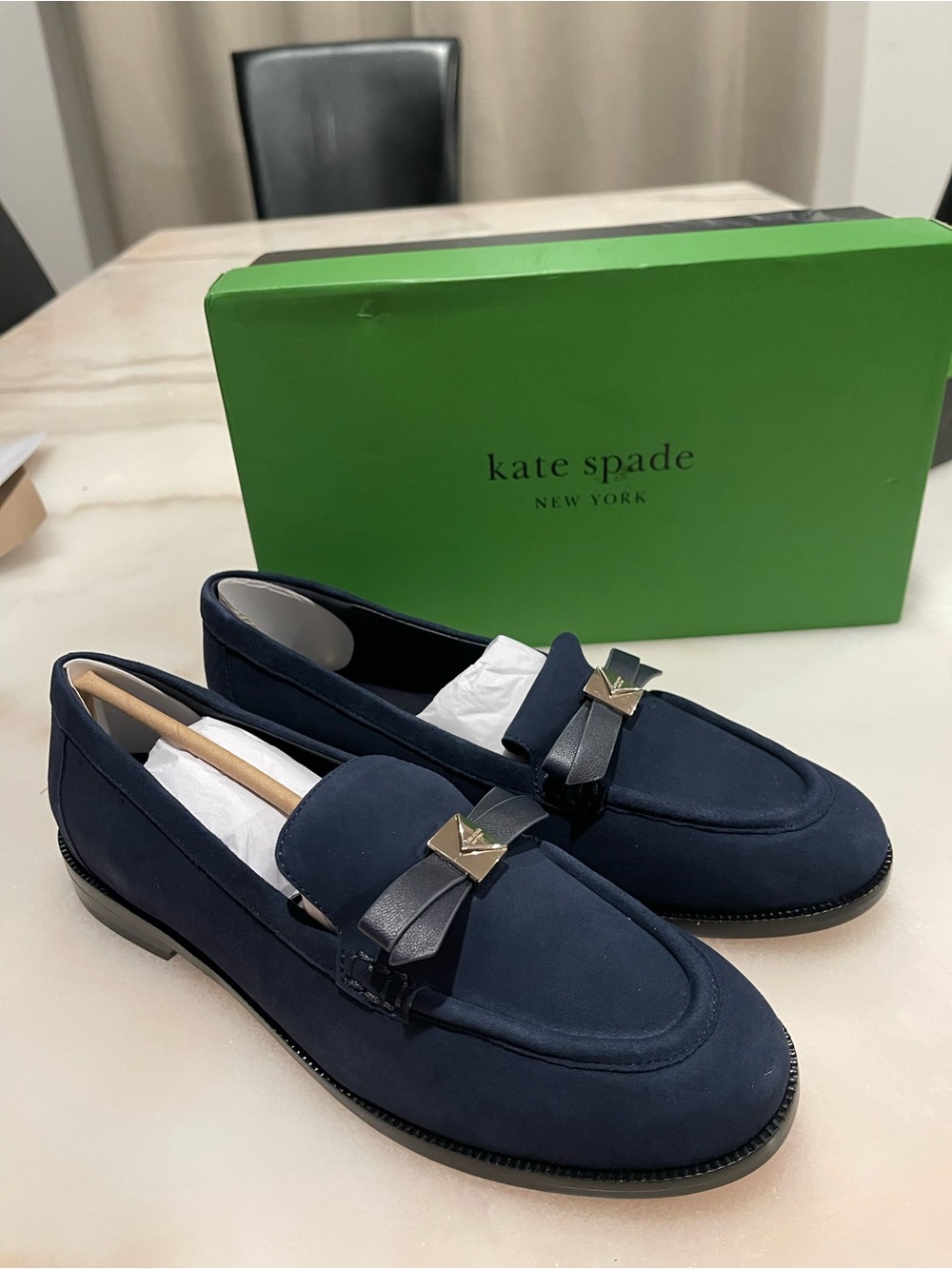 kate spade navy suede loafers with black bow and gold-tone accents